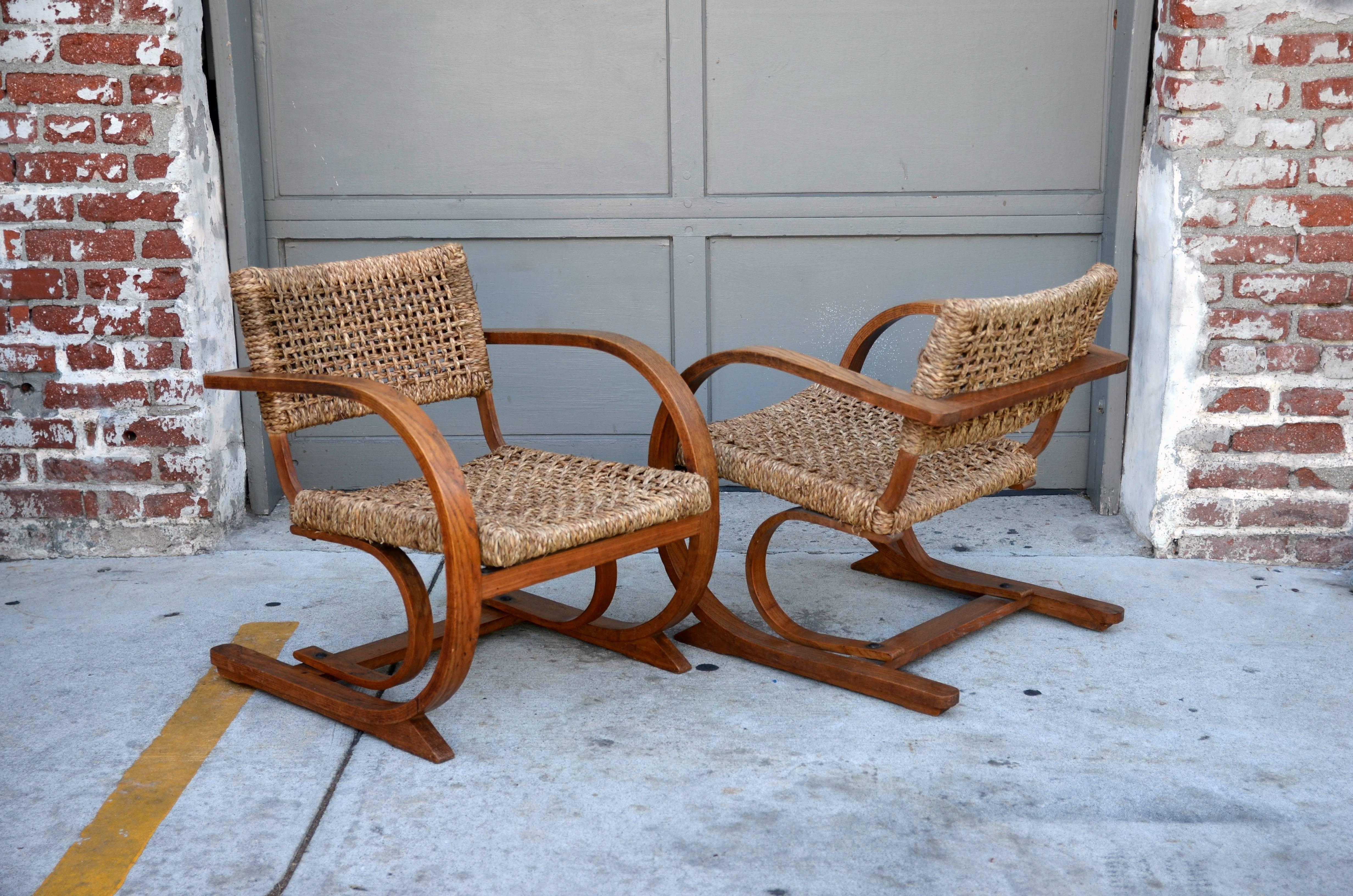 Pair of rope chair by Audoux-Minet for Vibo Vesoul. 22 in. arm height. Very comfortable.