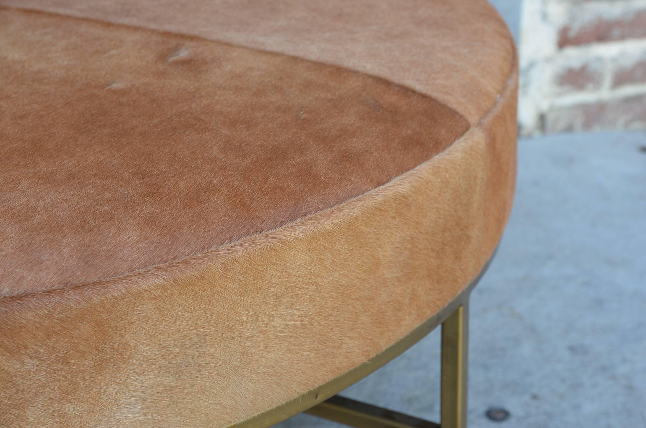 American 'Tambour' Natural Hide and Brass Ottoman by Design Frères