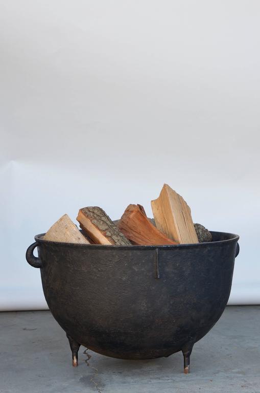 Large Patinated Iron Cauldron Wood Holder at 1stDibs