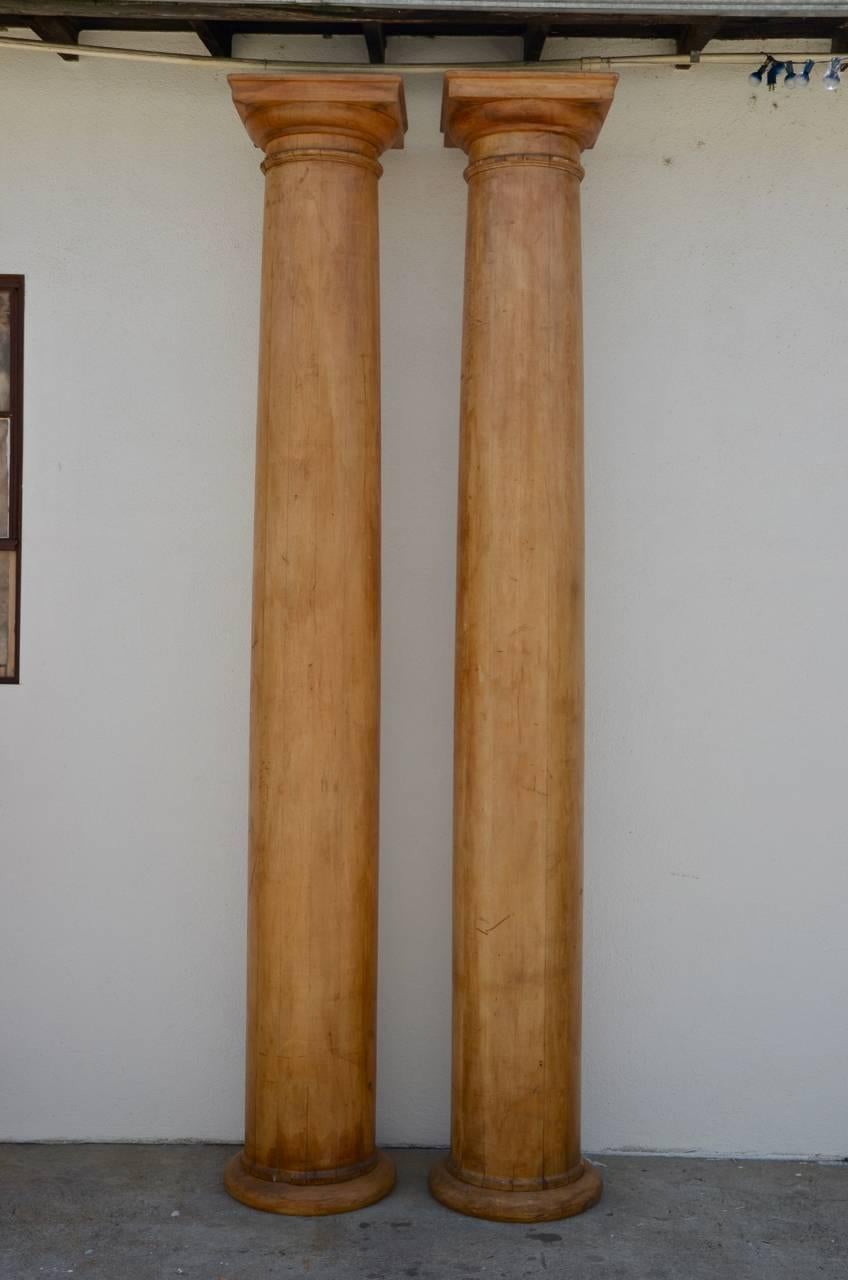 Pair of elegant 10 feet tall fluted decorative pine columns. Stunning.