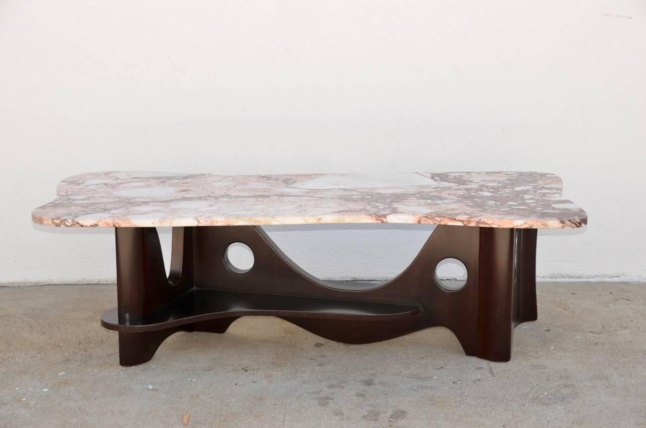 Sculptural free-form marble long coffee table. Chic organic design. Beautiful marble top.