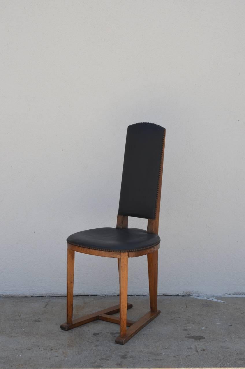 Pair of slender oak Arts & Crafts sledge chairs. Great for a breakfast or a game table.