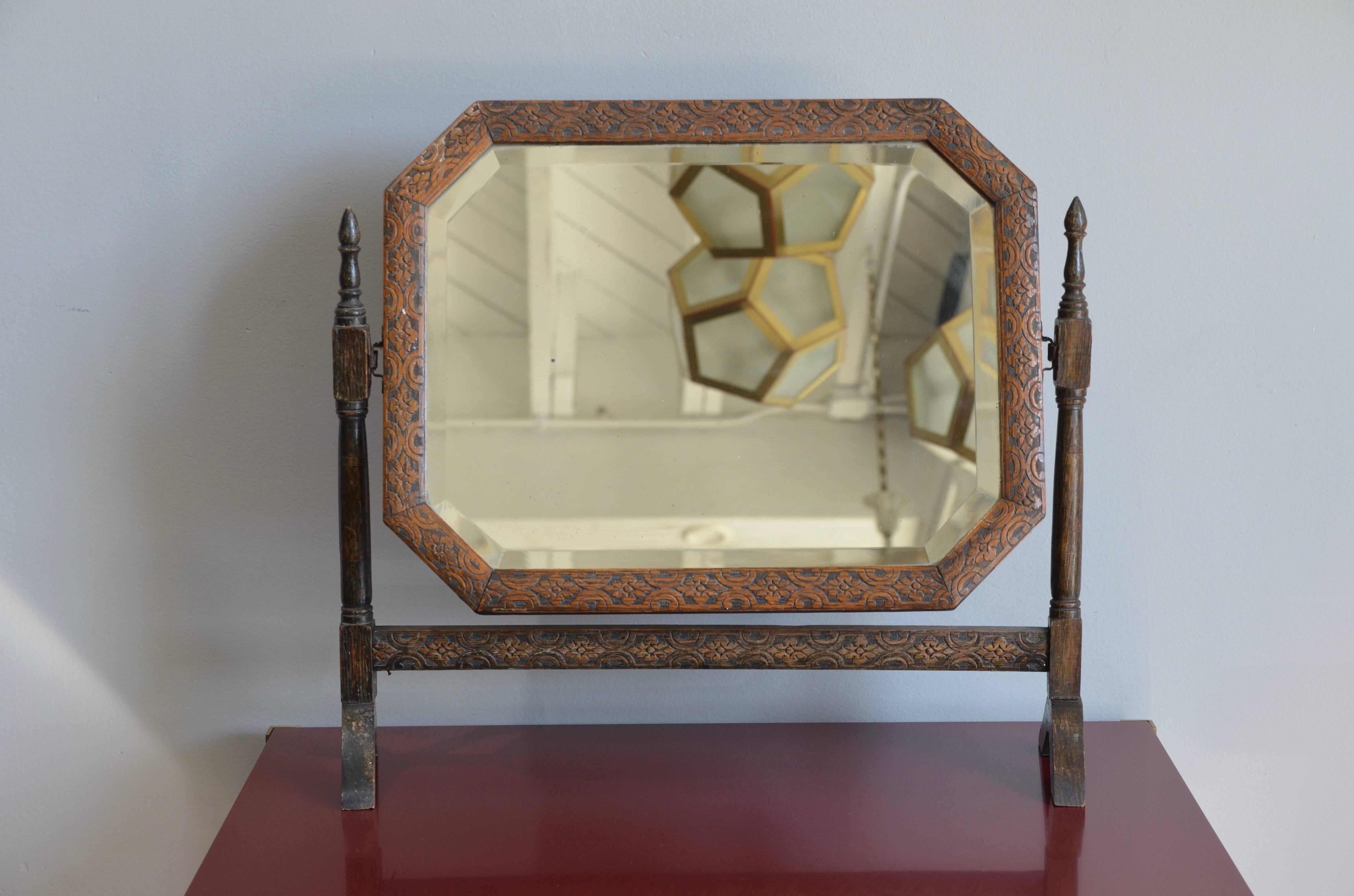 Carved oak American Arts & Crafts vanity tilt mirror. Great patina.