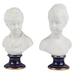 Pair of Brongniart Children Porcelain Busts after Houdon, Tharaud Limoges