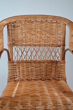 Poltrona in rattan realizzata a mano, opera artigianale e intrecciata a mano