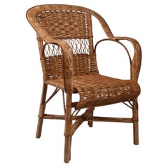 Poltrona in rattan realizzata a mano, opera artigianale e intrecciata a mano