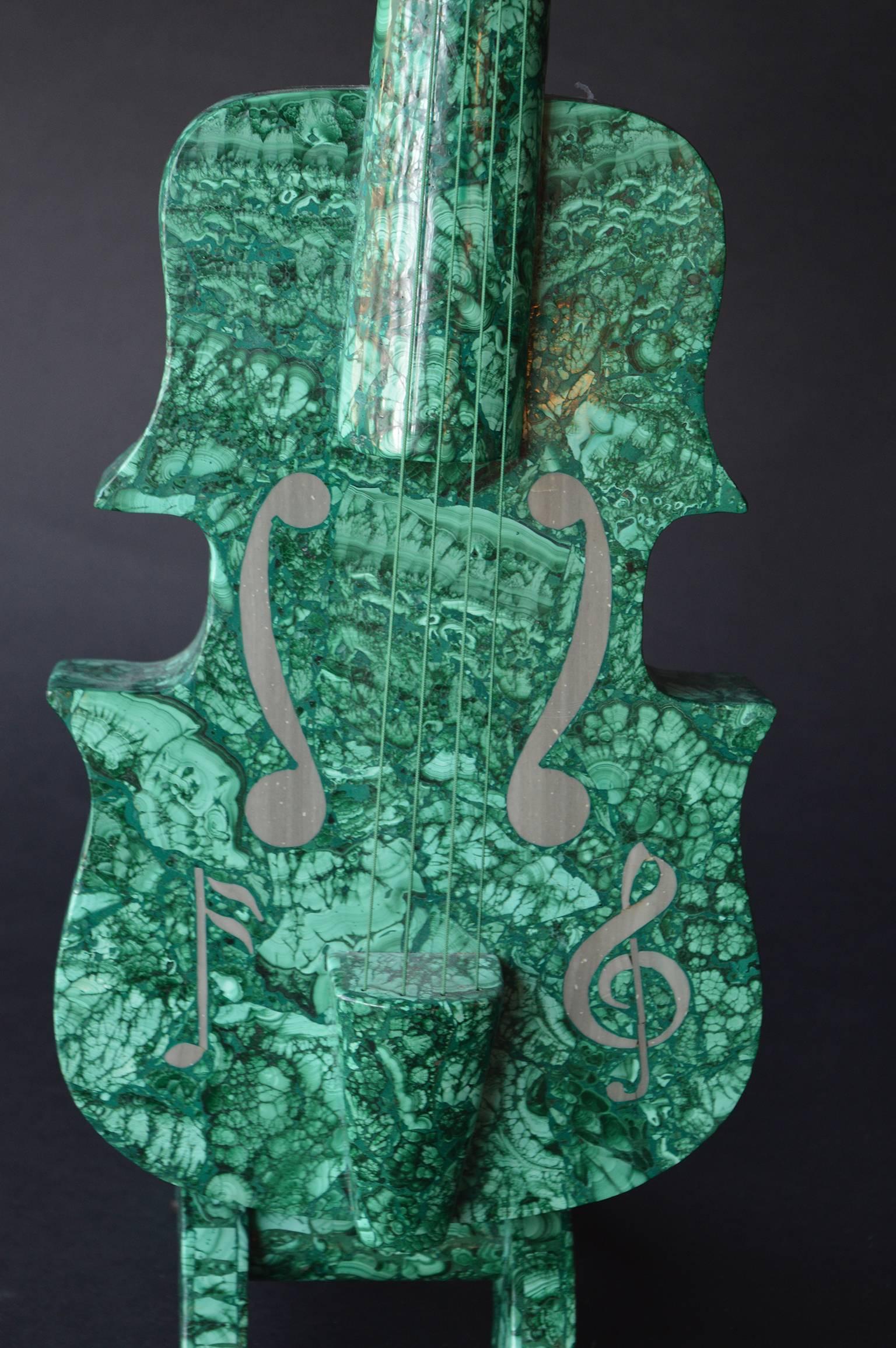 Carved malachite violin. Includes malachite stand.