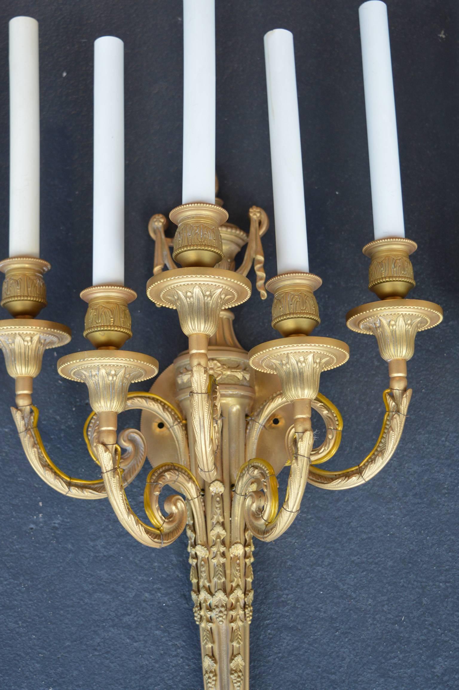 Set of ten Louis XVI gilt bronze sconces.