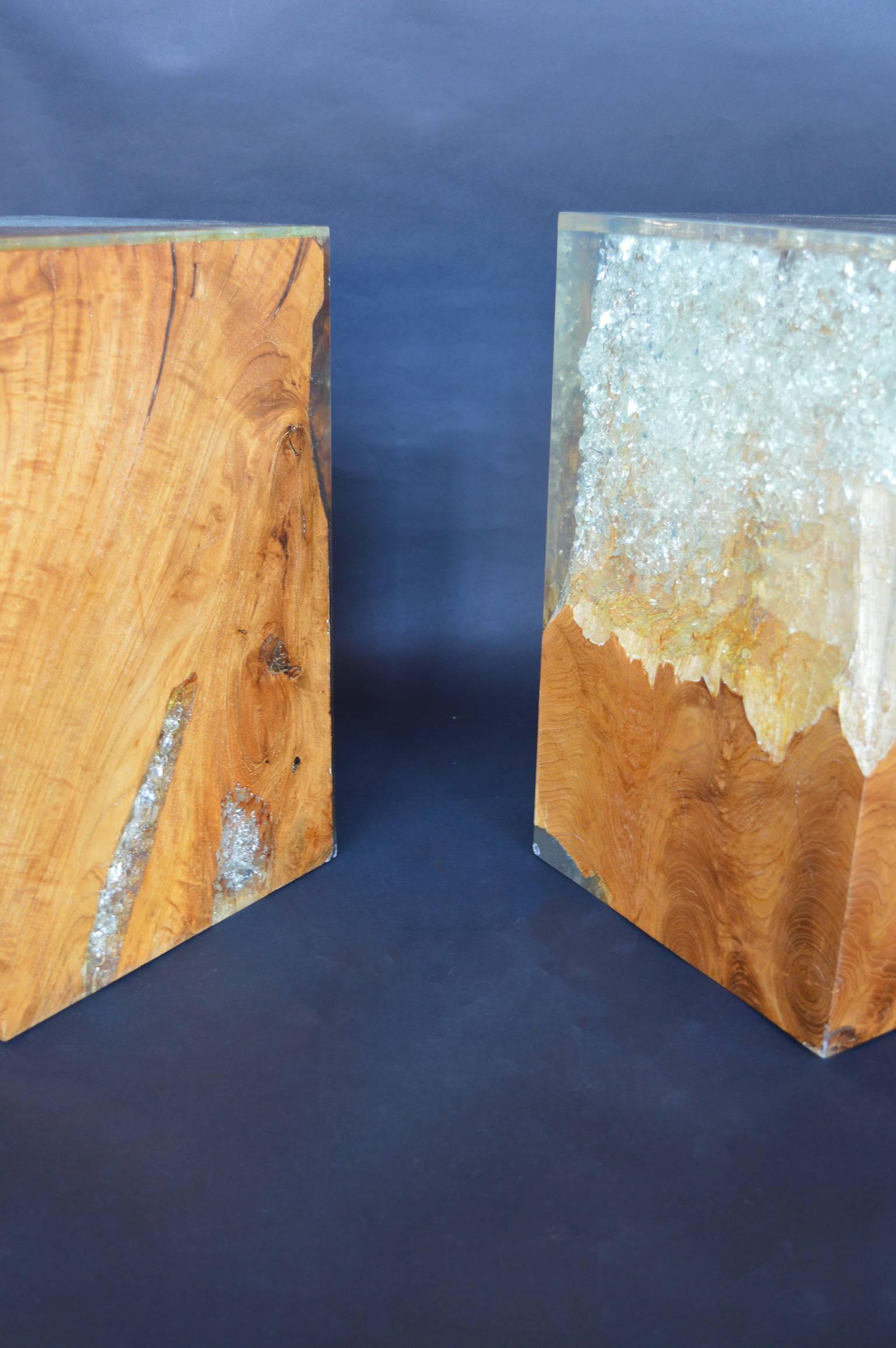 Wood stool encased in resin.