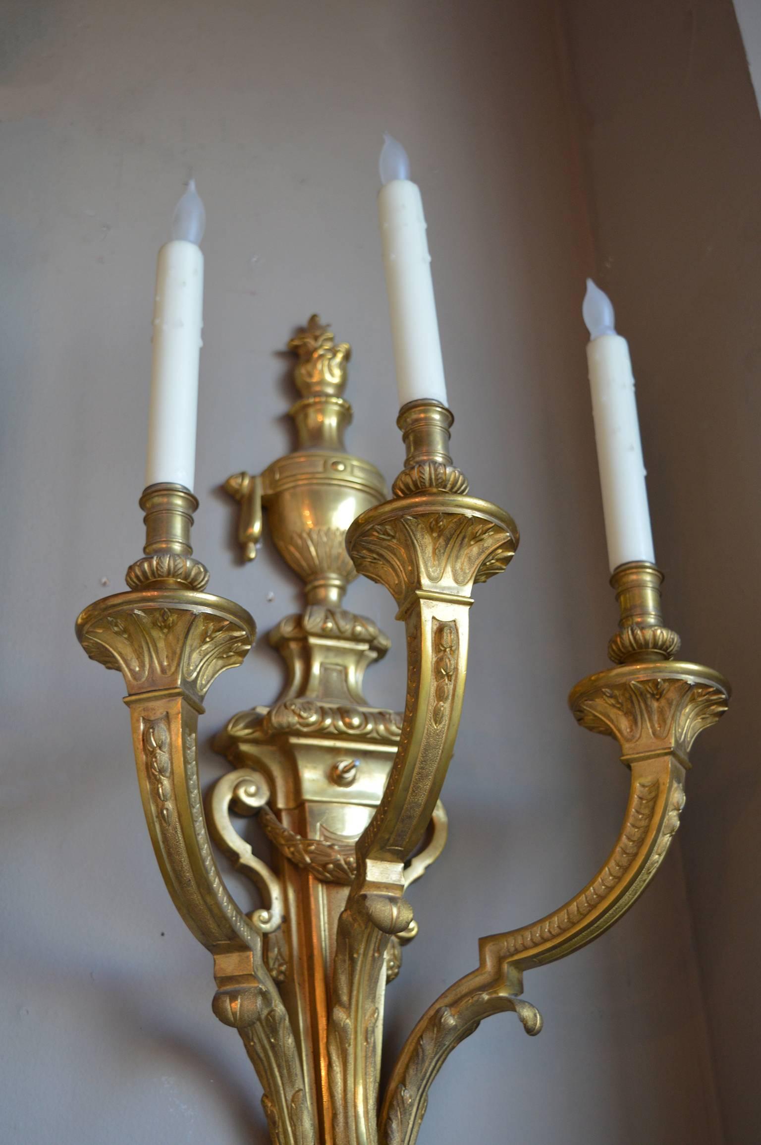 Pair of French bronze sconces.