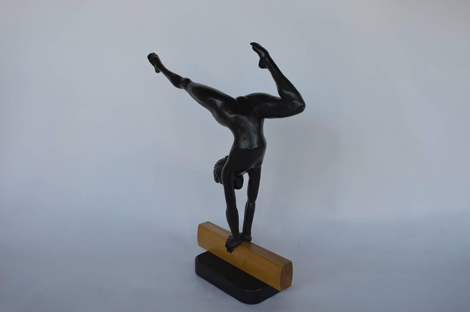 Art Deco bronze beam gymnast sculpture. Base is marble, the beam is wood and the gymnast is bronze.