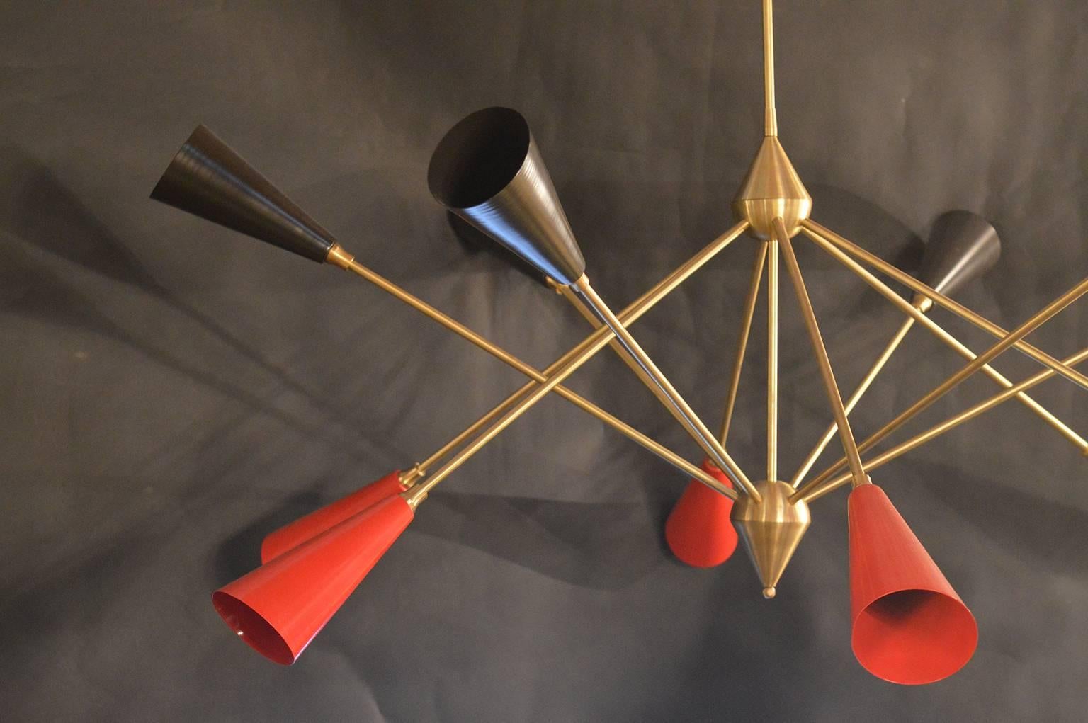 Mid-Century Modern twelve-arm chandelier with black and red shades.