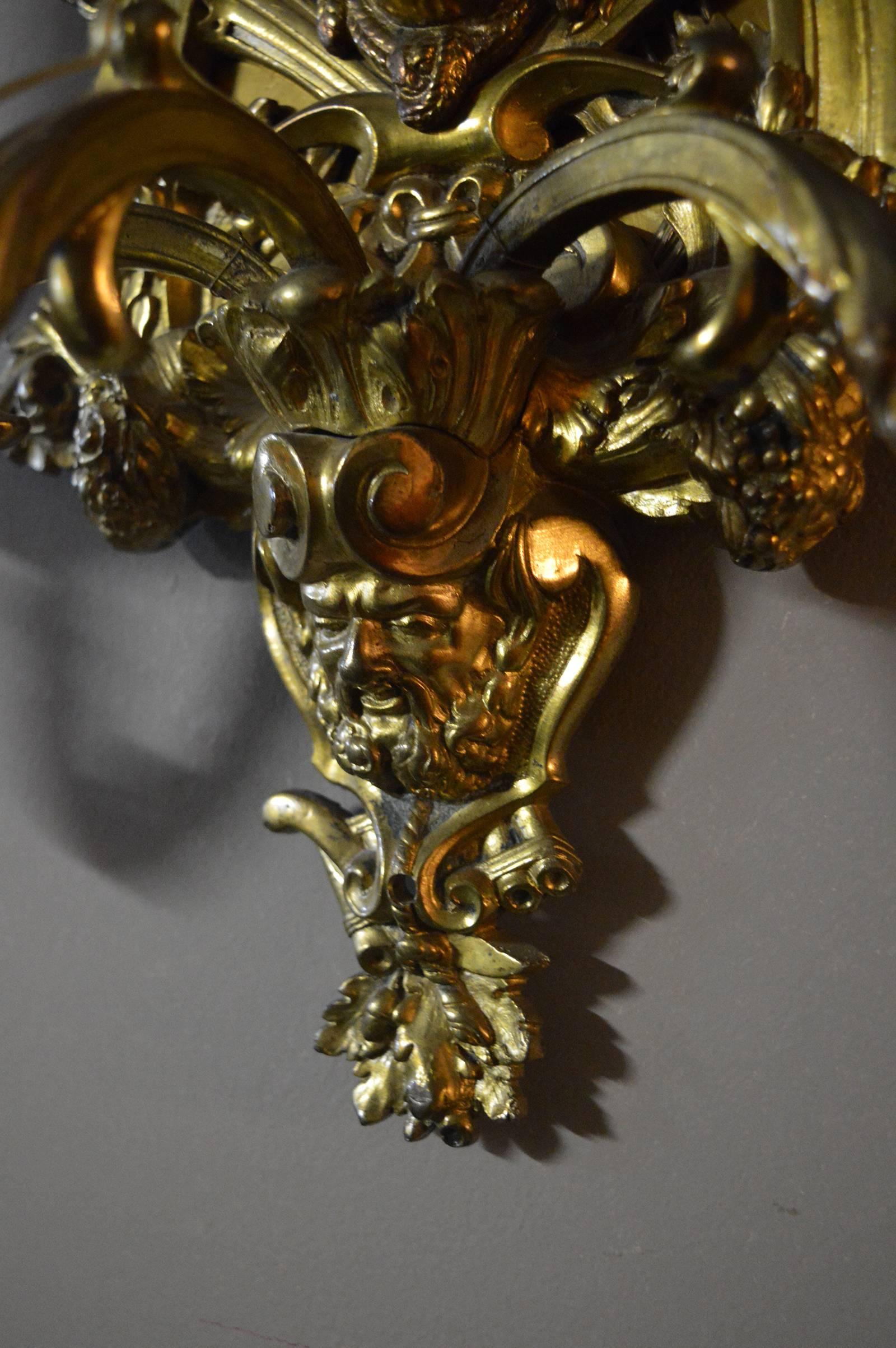 Pair of Detailed Brass Sconces In Good Condition For Sale In Los Angeles, CA