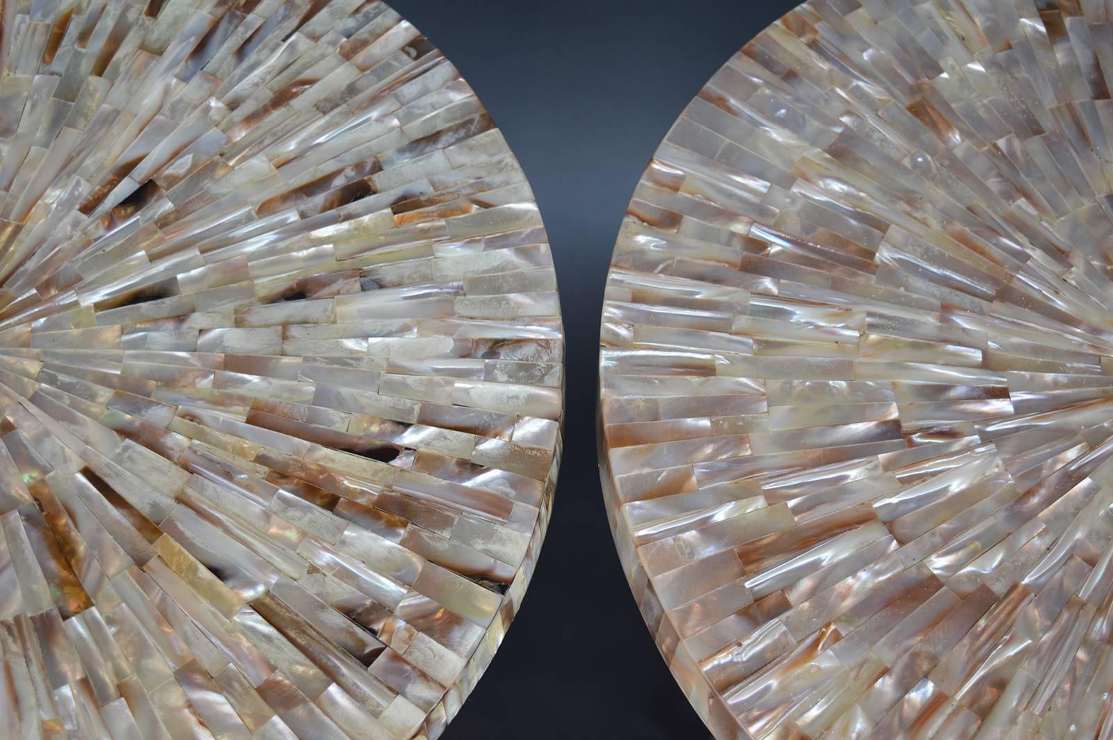 Pair of mother-of-pearl side tables with Lucite bases.