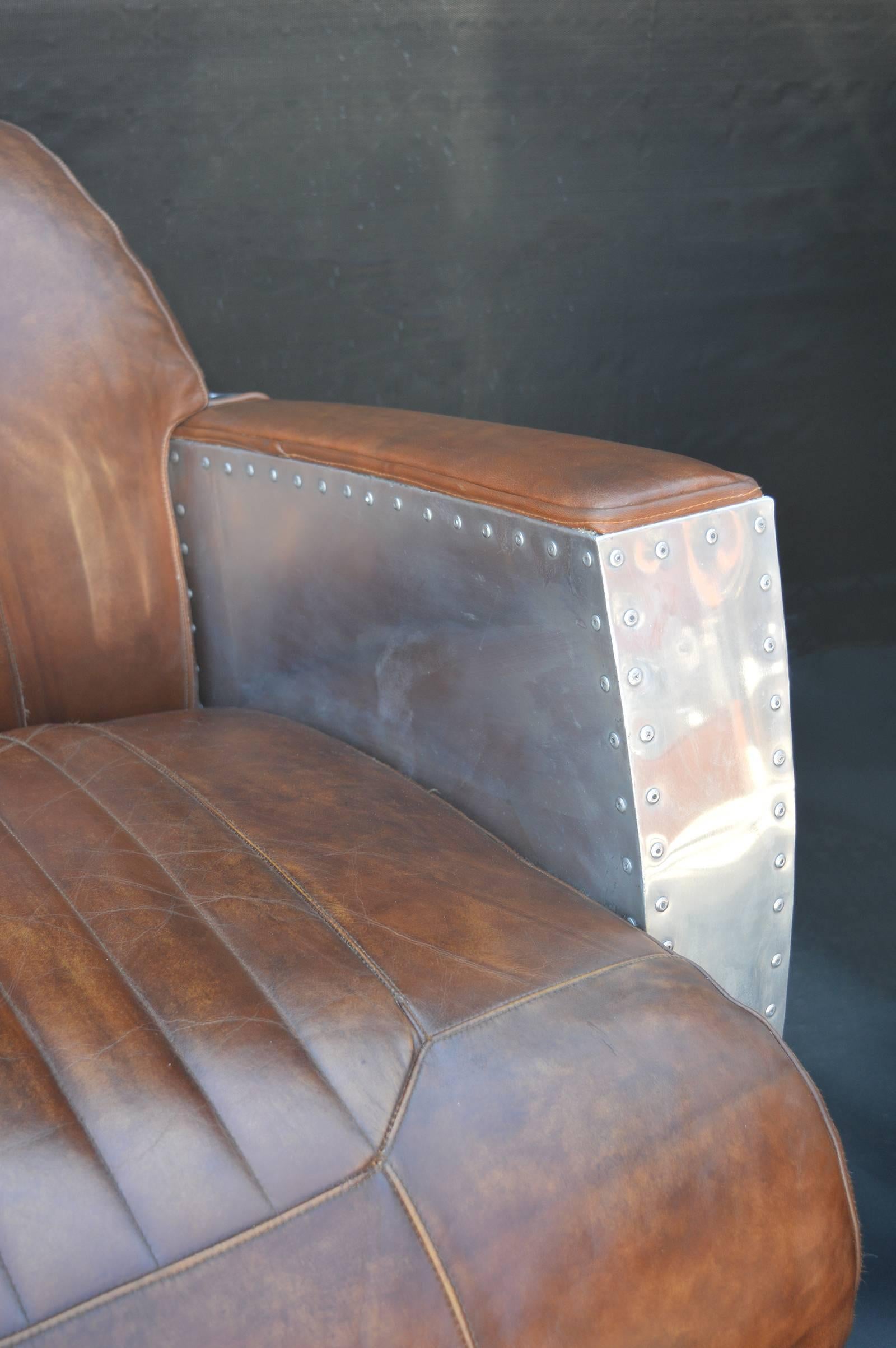 Late 20th Century Pair of Riveted Aviator Chairs