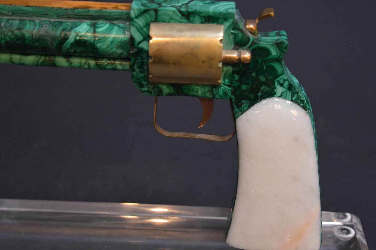 Malachite, marble and brass show hand gun. The piece was sculpted in the U.S. but mined in Africa