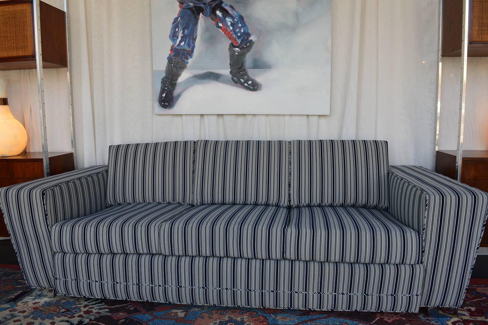 Vladimir Kagan style sofa, with custom upholstery. Chrome feet.
