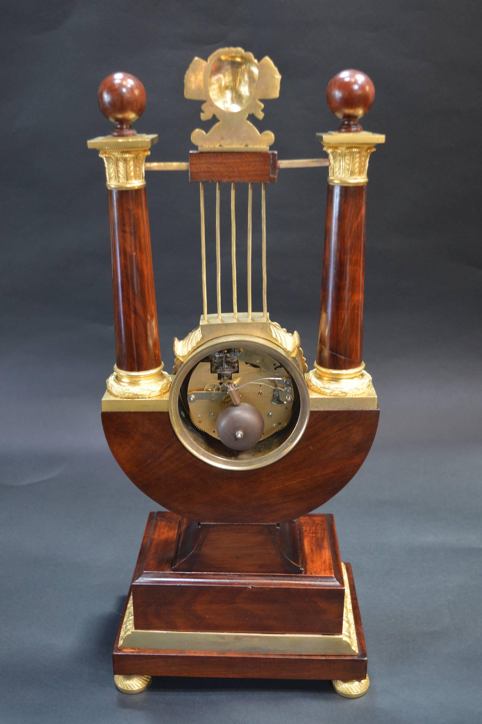 19th Century Empire Mahogany Clock with Gilded Ormolu For Sale