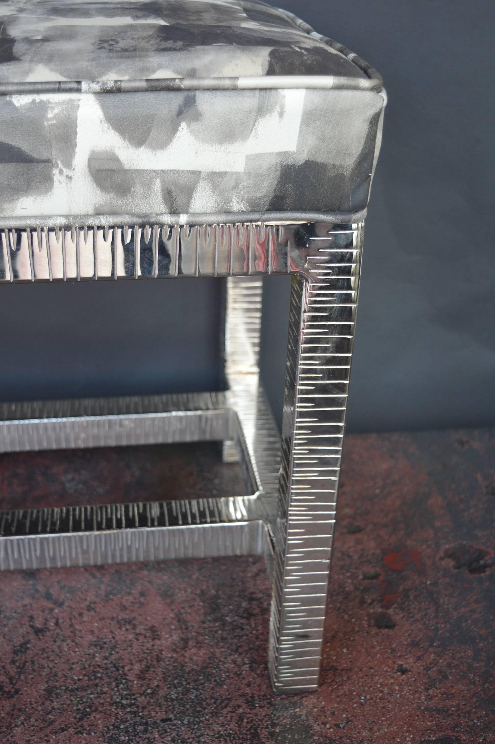 Nickel plated bench with special leather upholstery.