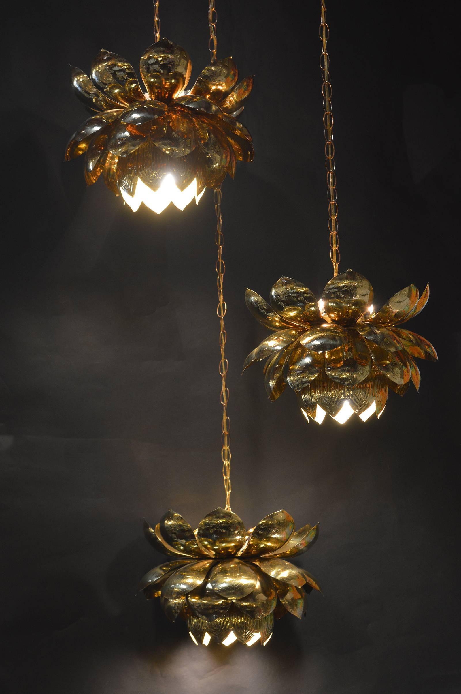 Brass pendant chandelier of Lotus Blossoms hanging. In the style of Feldman Lighting co.