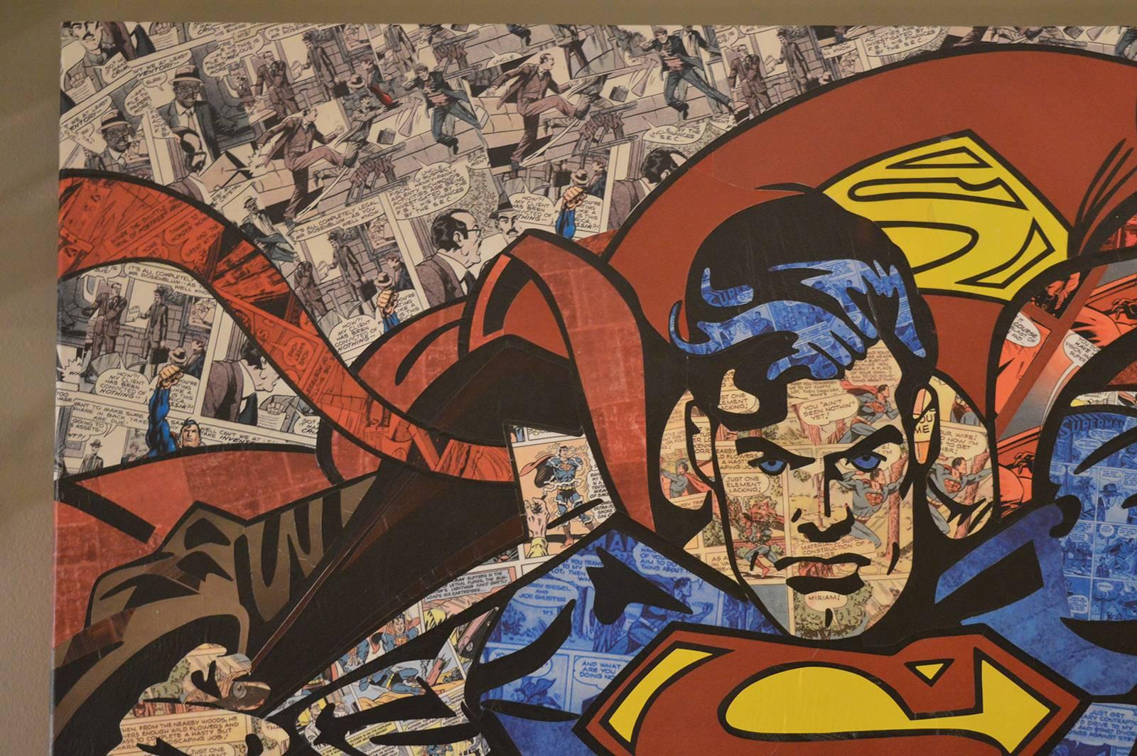 Super man Man of Steel Pop Art piece by Anabel Ruiz. Her art is mixed media with paint on Wonder Woman comics. Signed in the bottom left corner.
