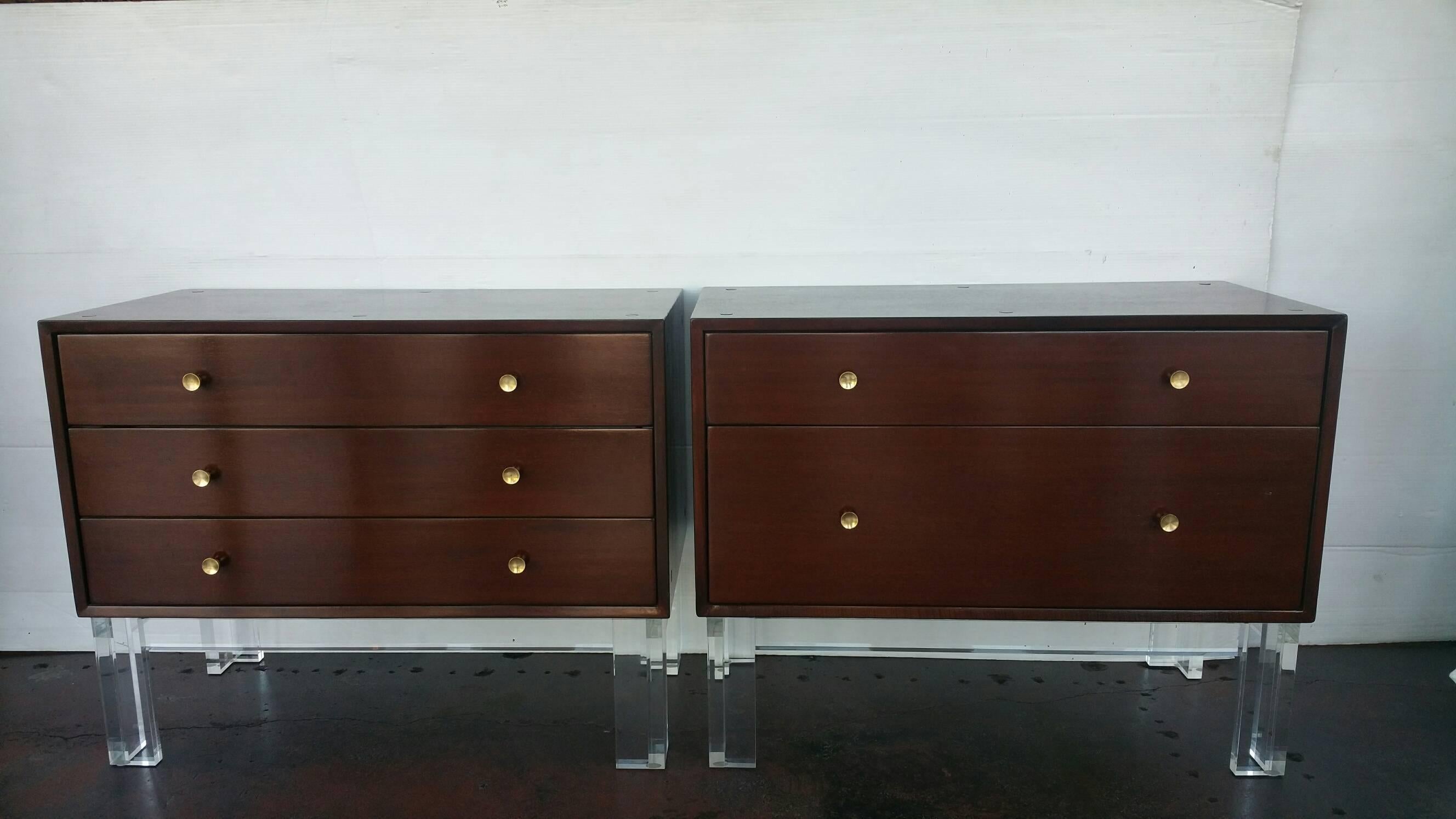 Pair of commodes or nightstands by Mengel Module.
One of them has three drawers and the second one has two drawers.
Mahogany outside and oak inside, brass hardware and Lucite base
manufacturer's mark inside both pieces on top drawers.