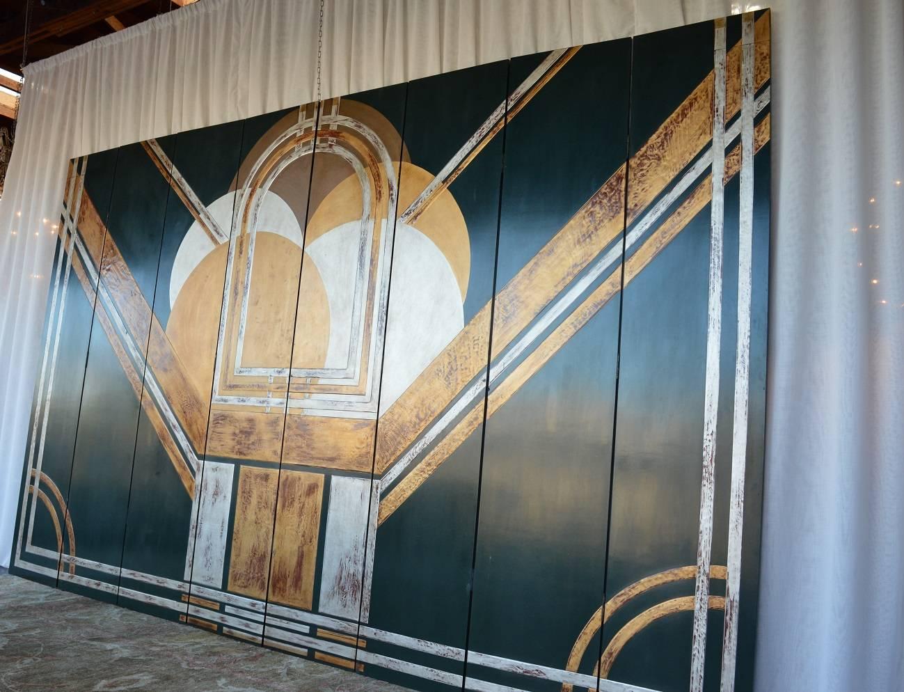 Large American Art Deco screen. Screen is detailed with antiqued golds and silvers. Each panel is 18 inches wide.