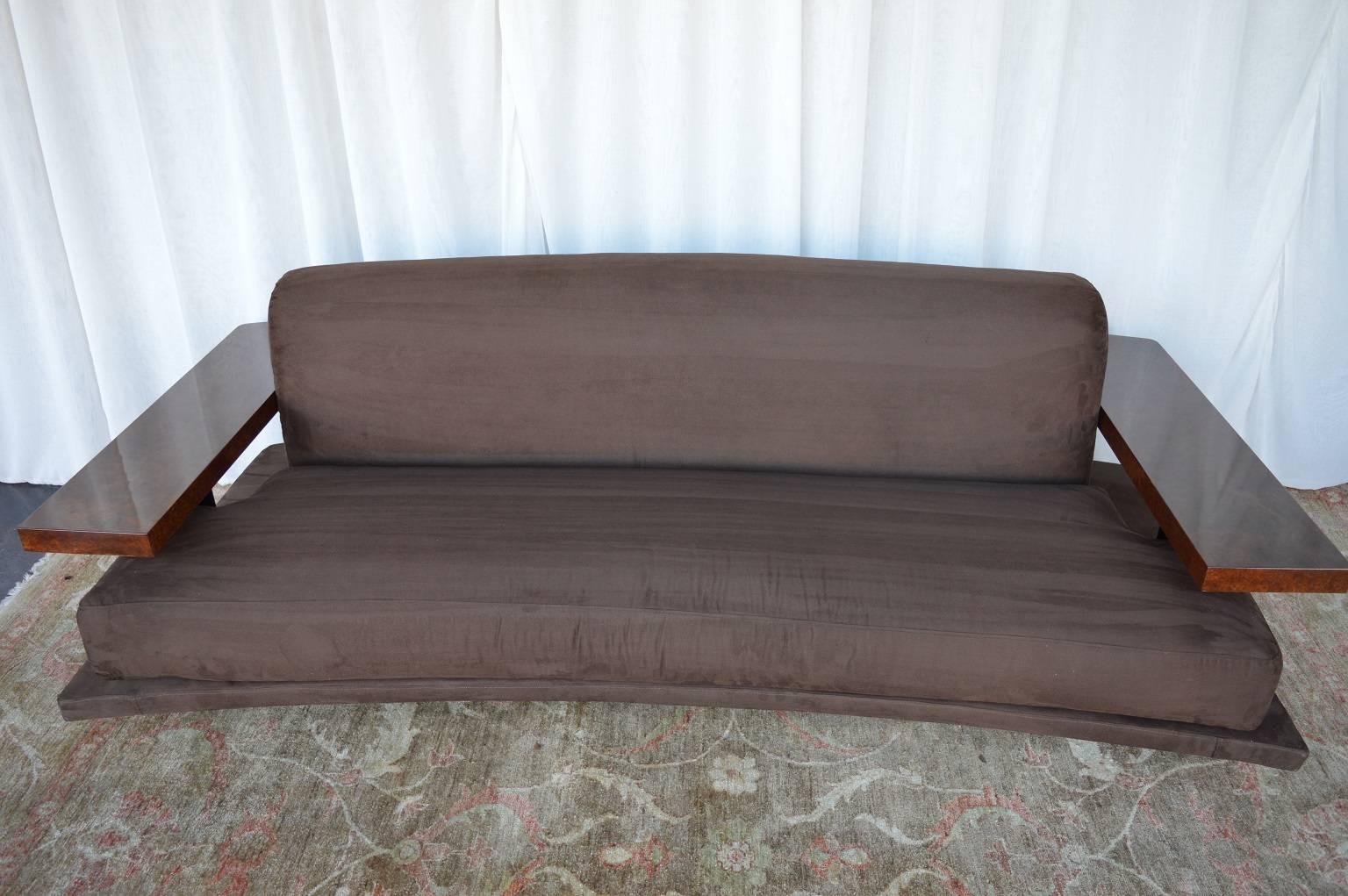 American Art Deco suede sofa. The arms of the sofa are made with bird’s eye maple and black ebony legs. Chocolate brown suede upholstery.