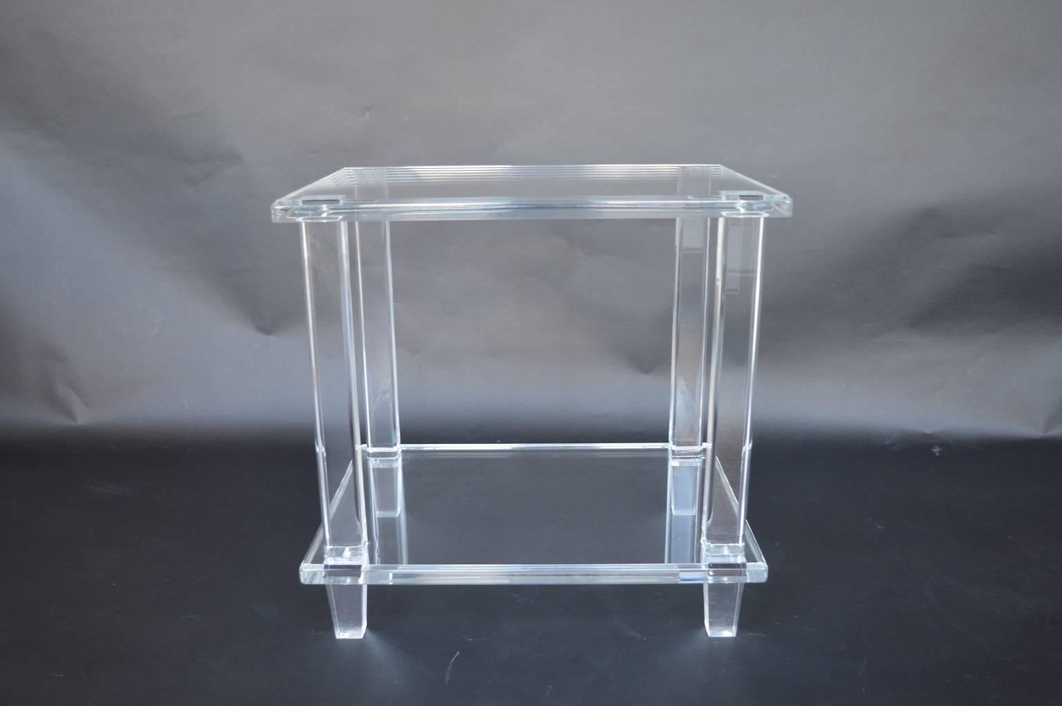 Pair of Lucite side tables,
newly polished,
made of thick Lucite (legs 1.75