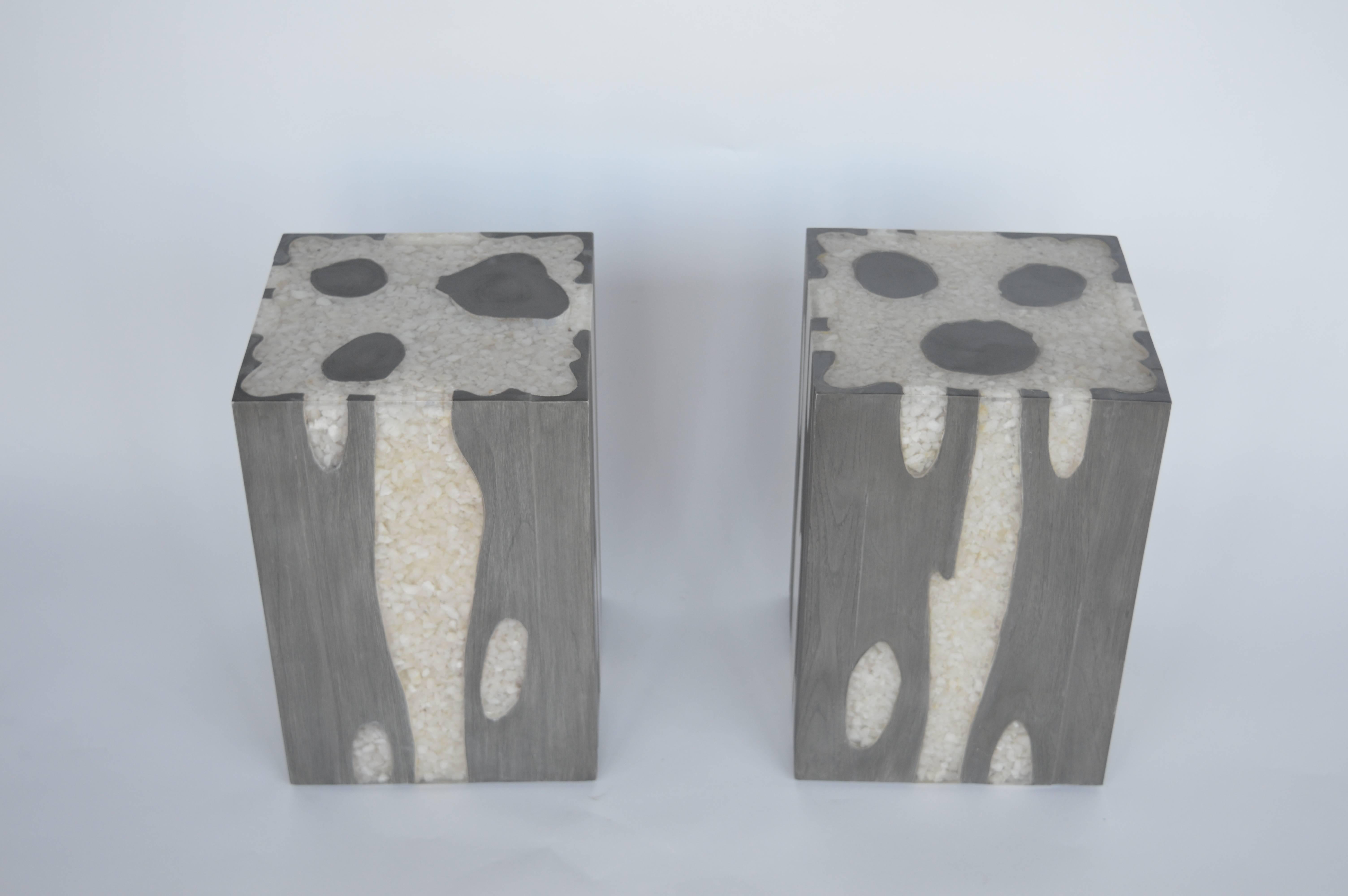 Pair of resin and wood stools/side tables. Stools are filled with small white stones then covered in resin and wood to give its artistic design.