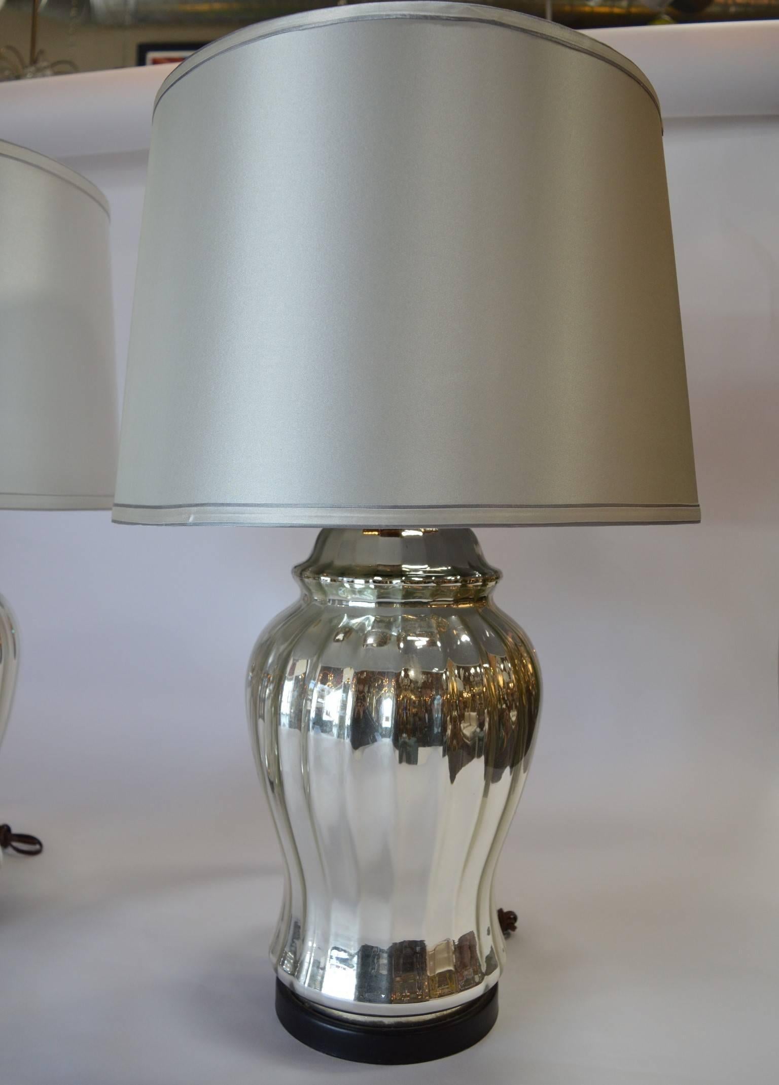 Pair of silver mercury glass table lamps.