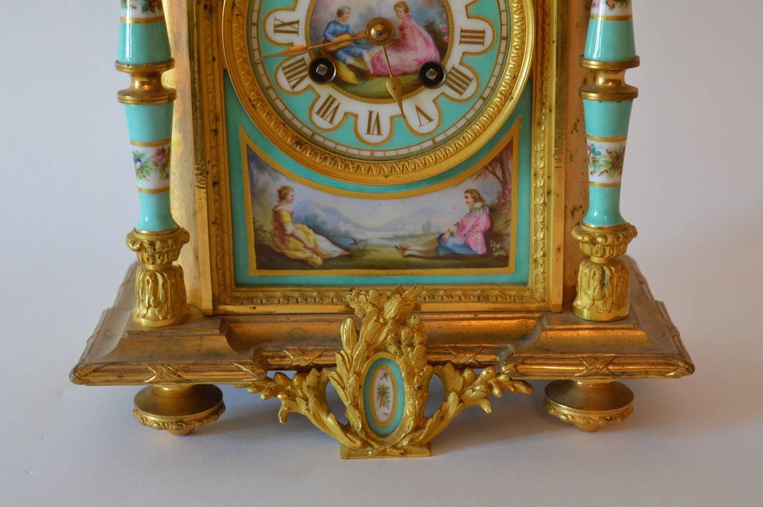 19th century hand-painted porcelain and gilt bronze clock.