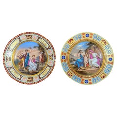Par de platos de porcelana pintados a mano de Royal Vienna del siglo XIX