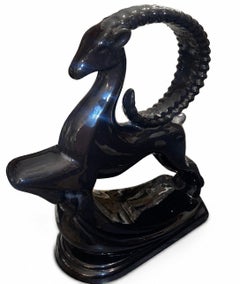 Par de esculturas «Gazelle» de Royal Haeger en negro brillante. EE.UU. Finales del siglo XX.