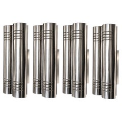 Four Italian Polished Chrome Cylindrical Wall Sconces, Italy, Mid 20th Century.
