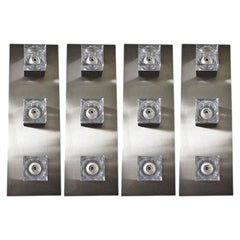 Juego de cuatro apliques Sciolari de cristal en forma de cubo y níquel cepillado. Italia, años sesenta.