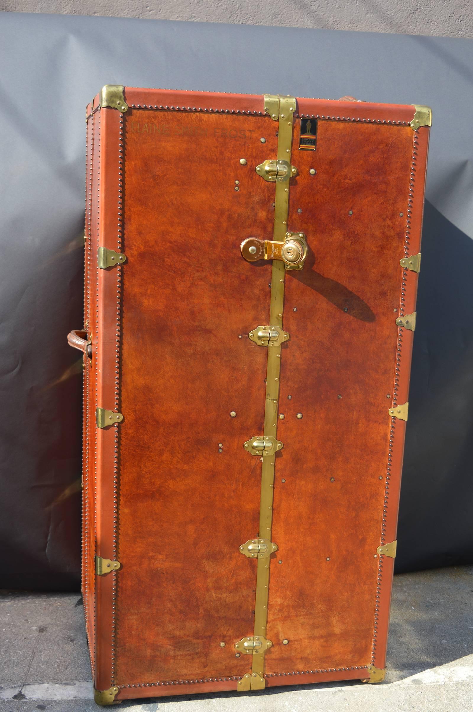 Large American leather bound steamer trunk. Brass locks and hinges.