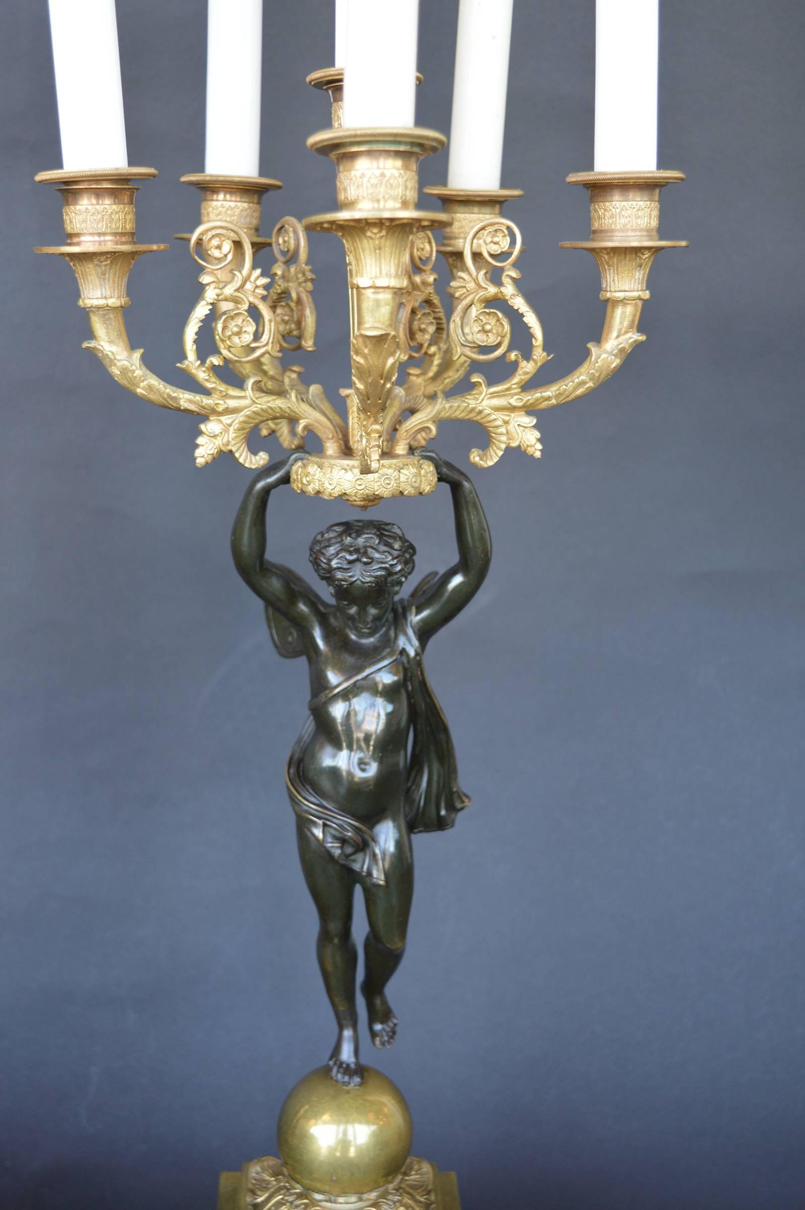 Pair of Empire style candelabra held by baby Fairies.