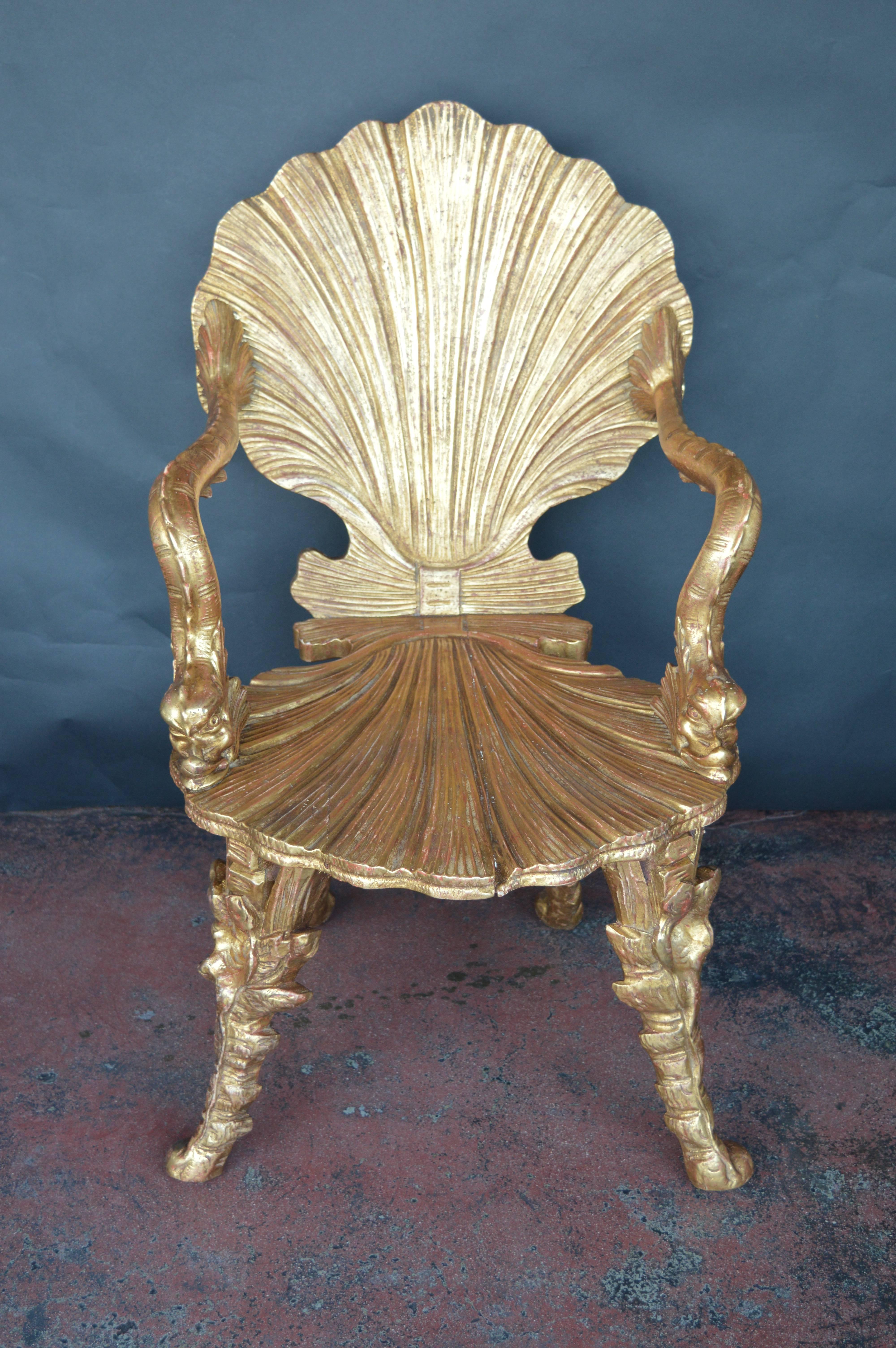 Two giltwood Grotto chairs. The chairs are not a pair, the chair on the left is shorter.

Left chair measurements: 32