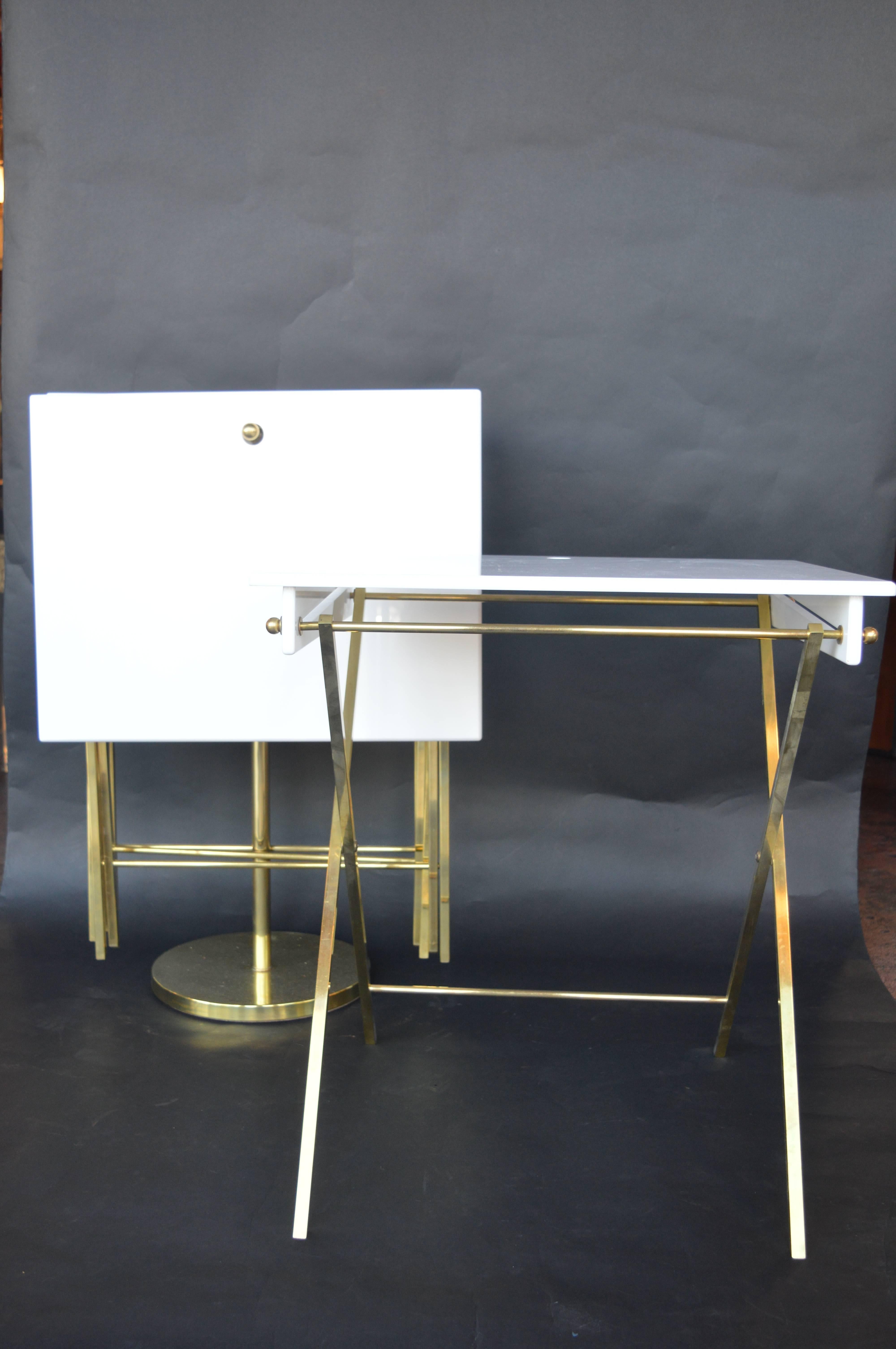 Set of four Lucite and brass tray tables by Charles Hollis Jones.