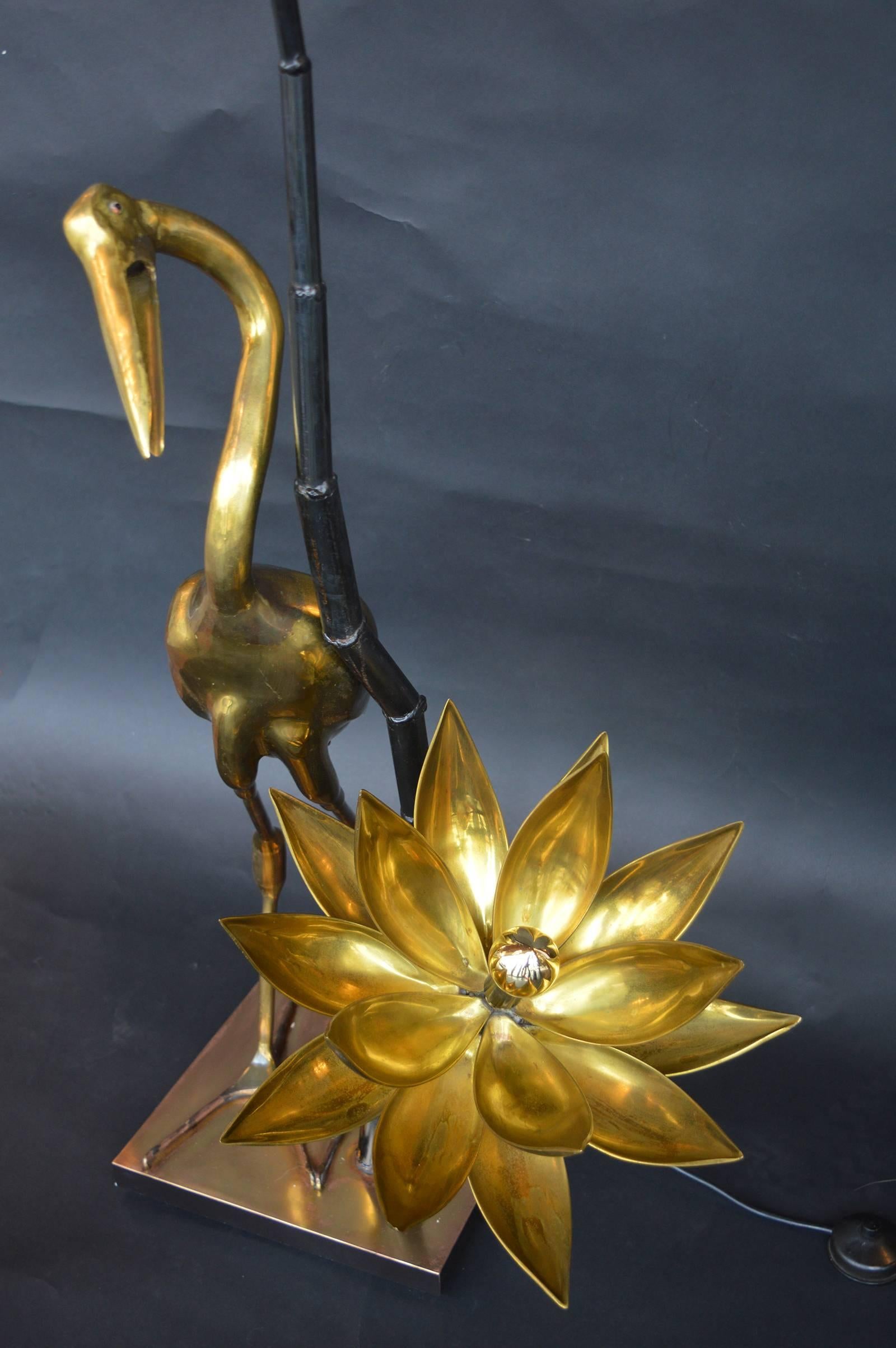 Brass crane and lotus floor lamp signed by C. Techoueyres, on the crane's tale feather.