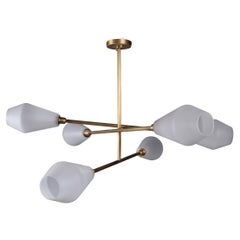 Contemporary handmade Brass chandelier with mouth blown frosted Glass shades