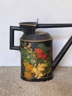 Beautiful vintage hand-decorated tin watering can in the Italian floral style