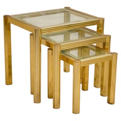 Elegant set of 3 brass and glass coffee tables, "Golden Élite," 1970