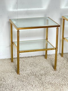 An elegant pair of vintage side tables made of brass and glass, from the 1970s