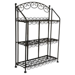 Stunning vintage wrought-iron shelf with 3 shelves, “Arabesco,” from the 1970s