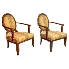 A gorgeous pair of vintage armchairs made of wood and fabric, from the 1970s