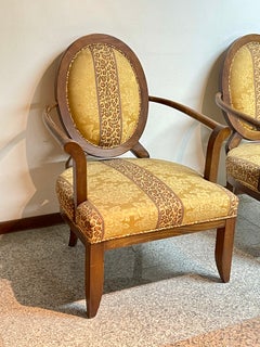 A gorgeous pair of vintage armchairs made of wood and fabric, from the 1970s