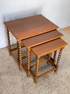 Elegant set of three solid wood side tables with twisted-leg design, 1970