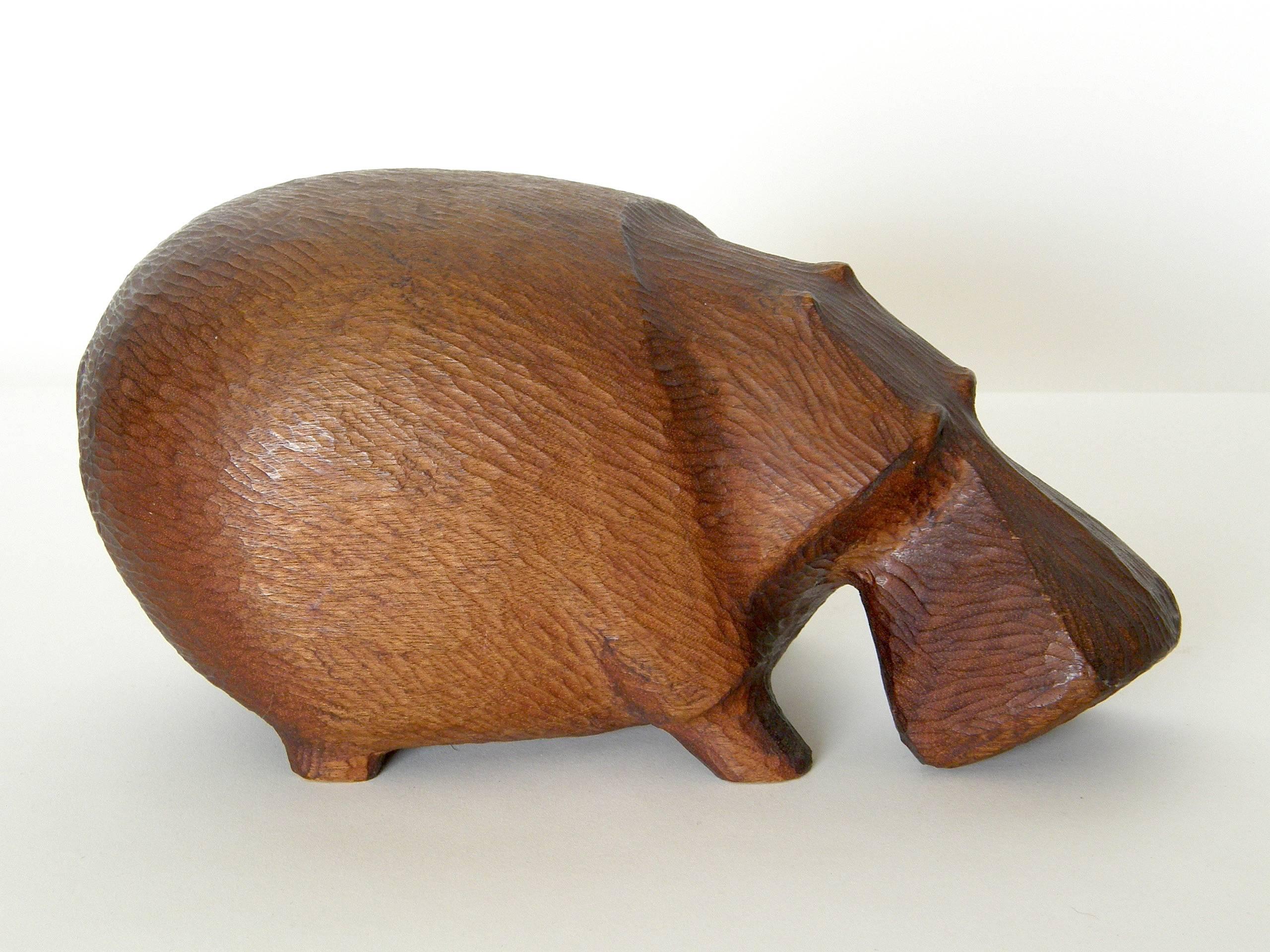 carved wooden hippopotamus